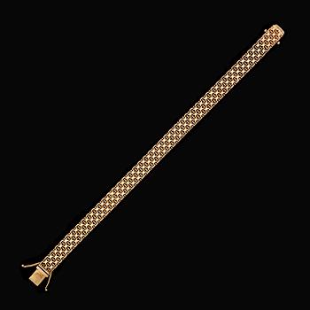 ARMBAND, 18 k guld, x-länk, svenska stämplar 1967. Vikt ca 18 gram.