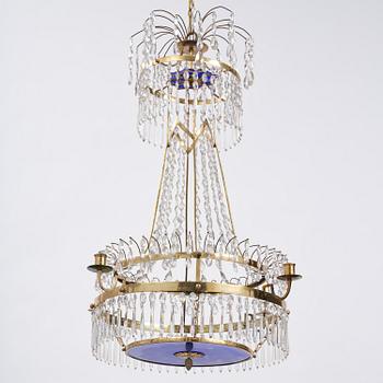 A late-Gustavian five-light gilt brass and cut glass chandelier, Stockholm, late 18th century.