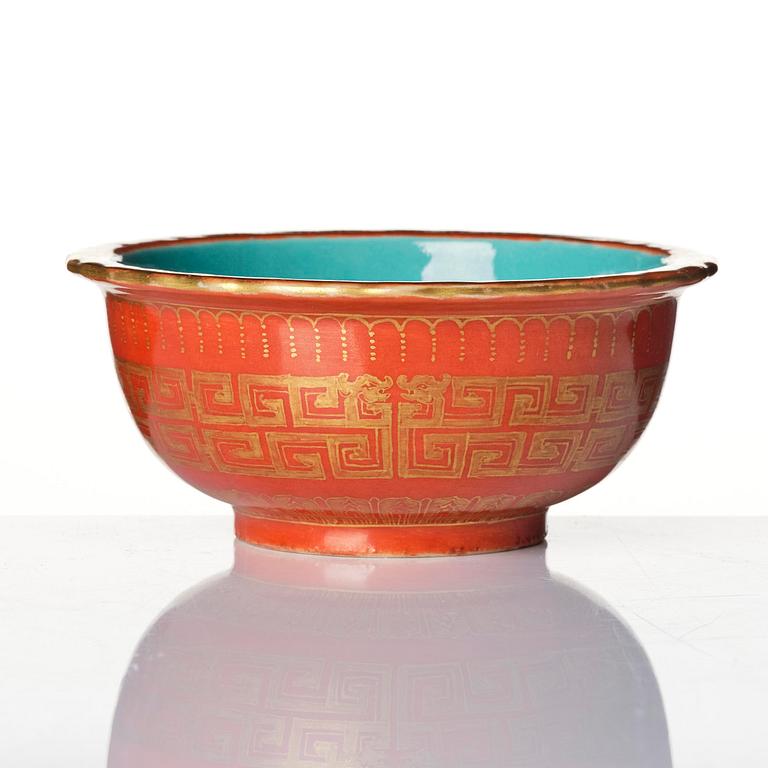 A coral red ground and gilt decorated turquoise enamelled bowl, Qing dynasty, Daoguang mark and period (1821-50).