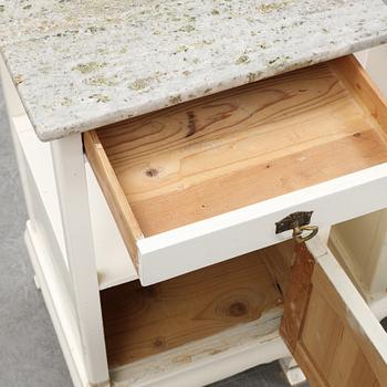 A pair of early 20th century bedside tables.