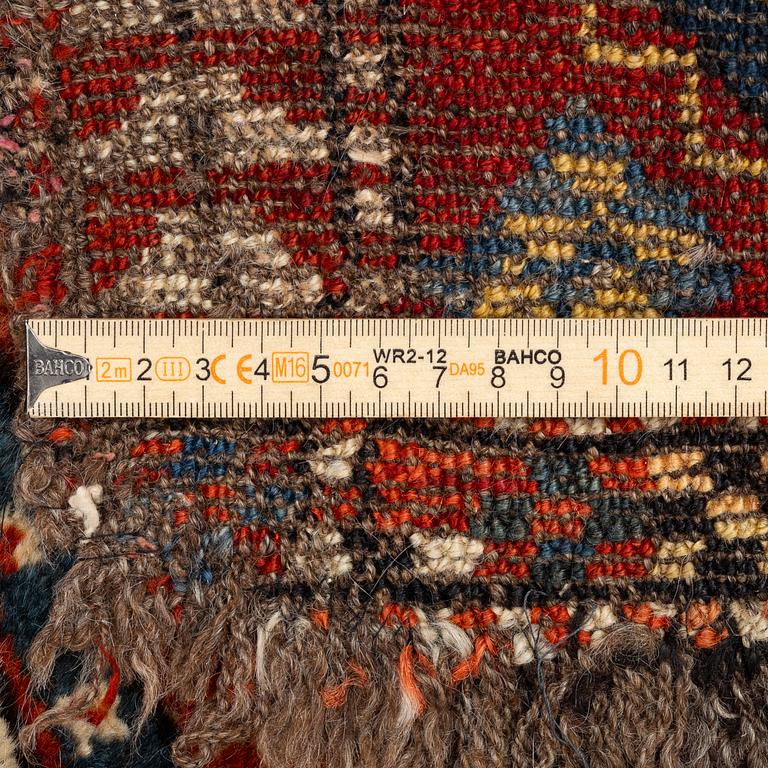 An antique Yastik rug, possibly Afghanistan, c. 110 x 57.