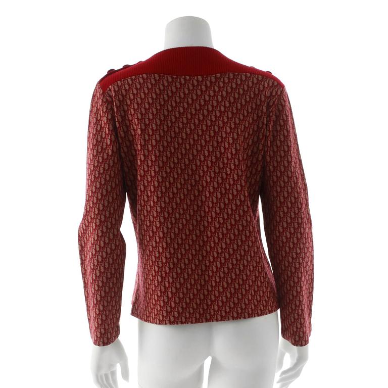 CHRISTIAN DIOR, a wine red monogrammed sweater i wool and blend material.