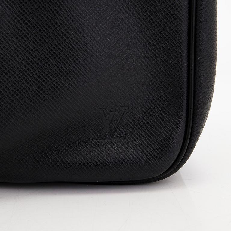 Louis Vuitton, a 'Taiga Kendall PM' weekend bag.