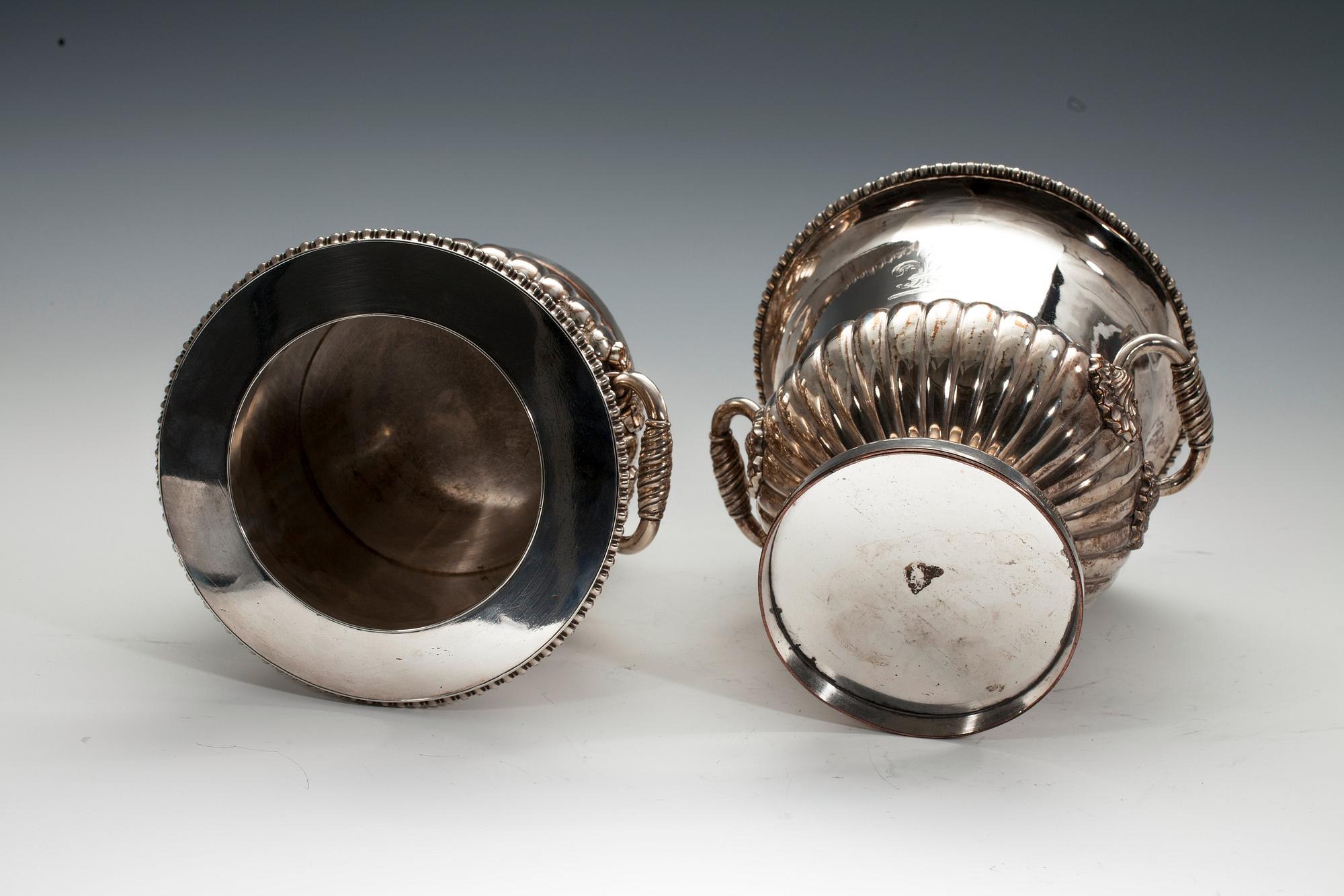 A PAIR OF CHAMPAGNE COOLERS.