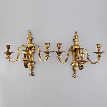 A pair of gilt bronze Louis XVI style wall lights. Late 19th century. 80.