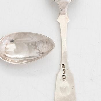 14 silver spoons, a knife and fork, with family crest. Porvoo, Kuopio, Helsinki, and Nichols & Plinke, 1832-1861.