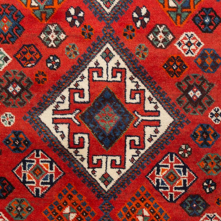 An old Shiraz rug, c. 240 x 155 cm.