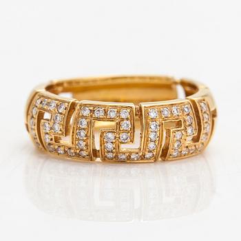 Versace, An 18K gold ring with diamonds ca. 0.12 ct in total. Marked Versace.