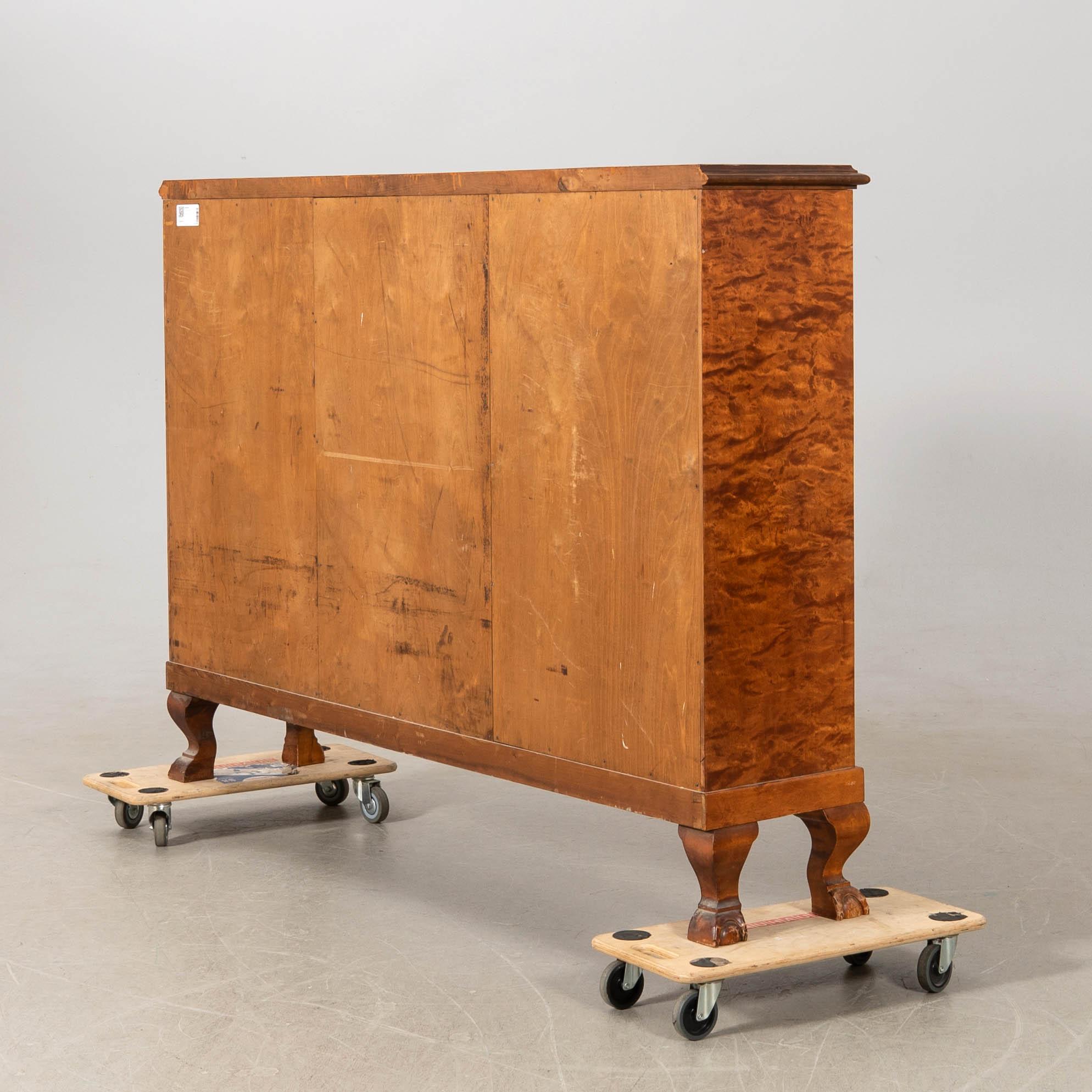 Display cabinet, 1920s.