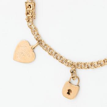 Bracelet, 18K gold, with charms.