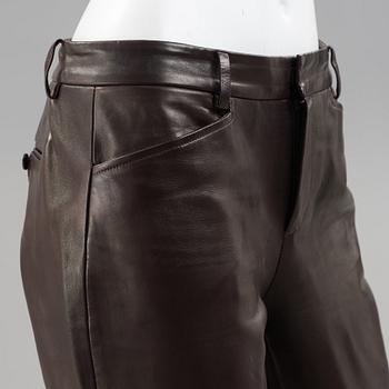 Apair of dark brown leather pants by ralph lauren.