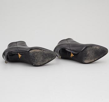 PRADA, a pair of black leather boots, size 35.