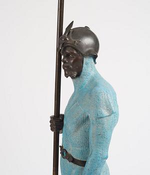 A bronze sculpture of a man in armour, late 19th century.