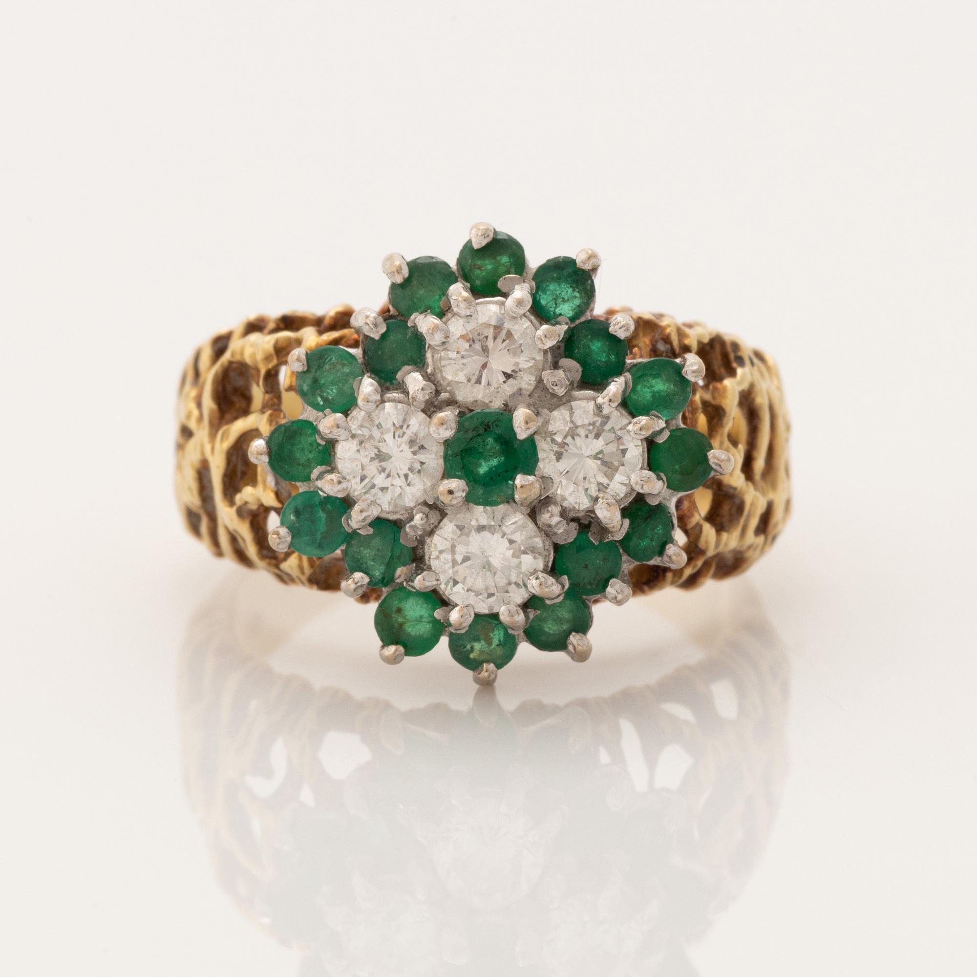 18K gold and brilliant cut diamond and emerald ring.