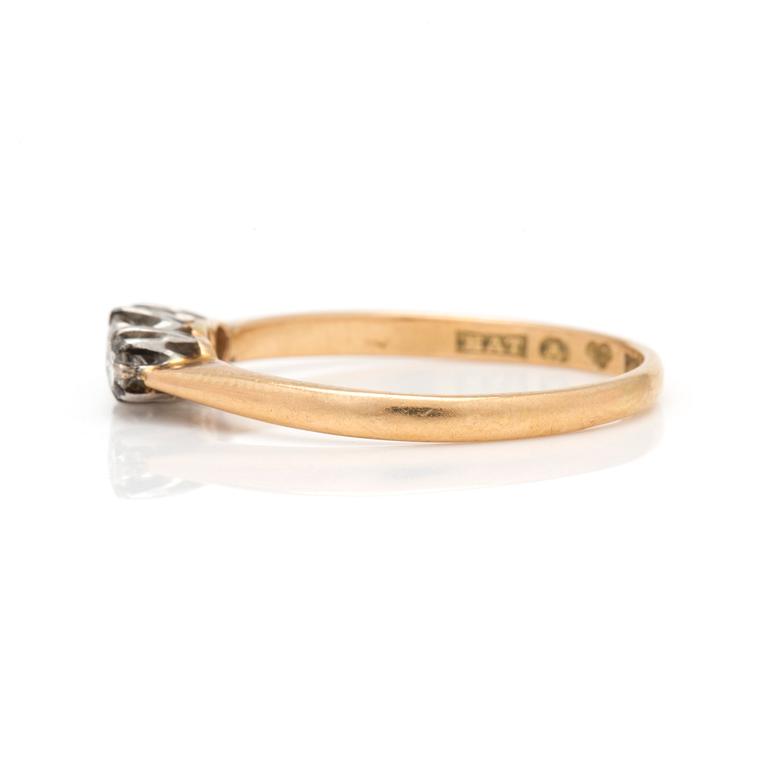 A ring with old-cut diamonds.