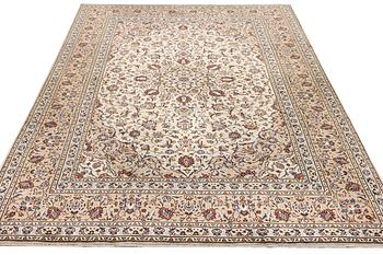 A Keshan carpet, c. 348 x 240 cm.