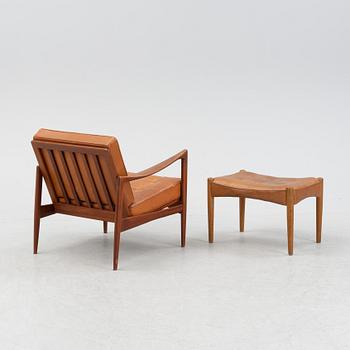 A 1960's 'Kandidaten' easy chair by Ib Kofod Larsen for OPE with additional, not original, stool.