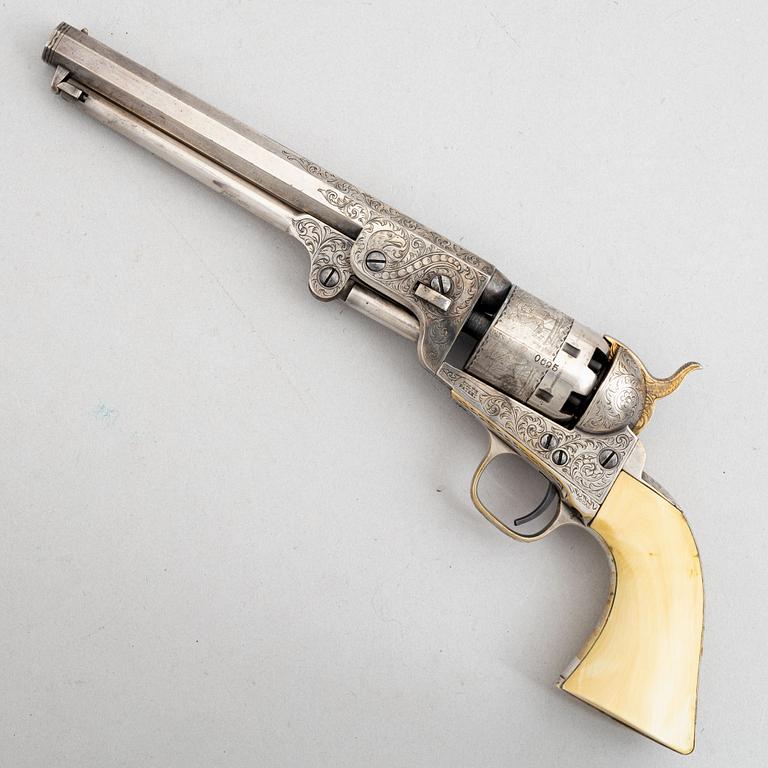 A percussion revolver, Colt 1851 Navy, in case, from the year 1863.