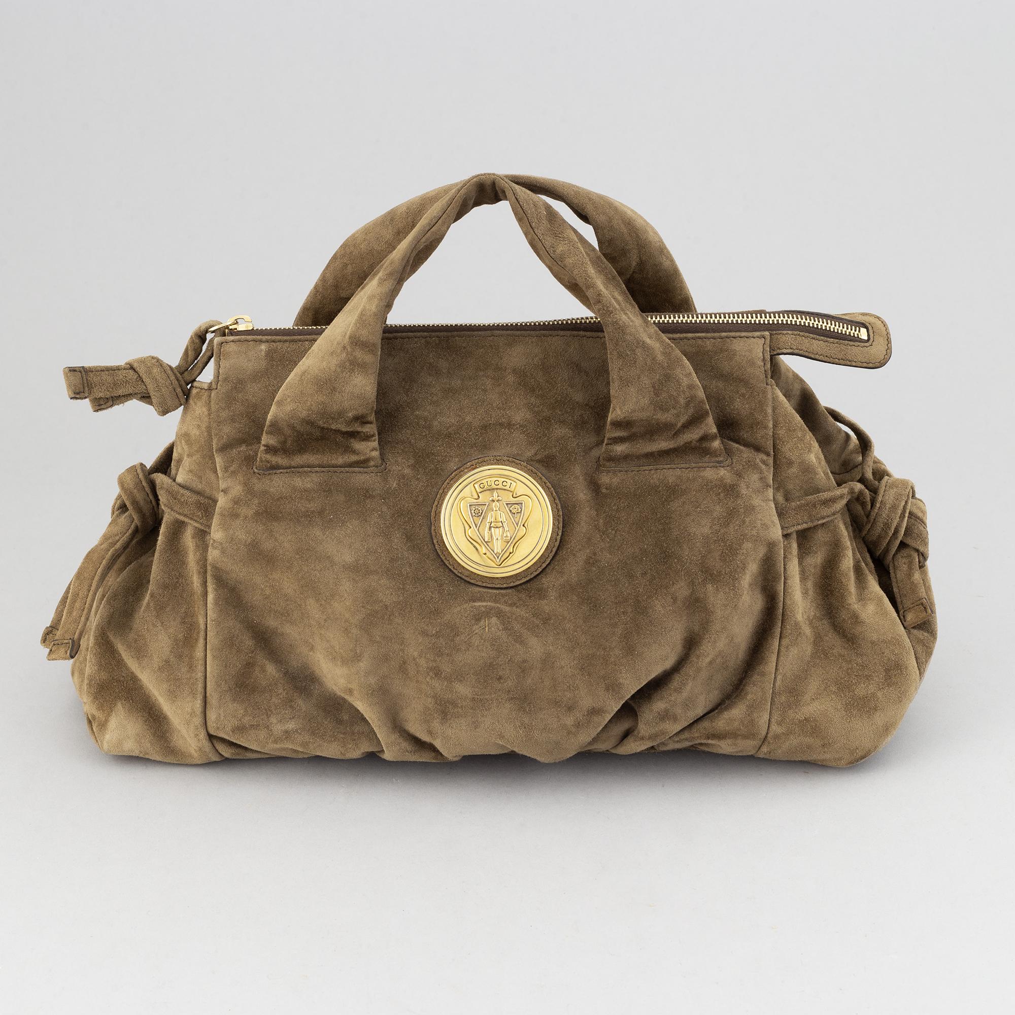 Gucci, a suede bag.