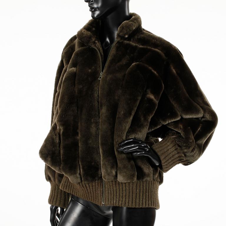 CHRISTIAN DIOR, a lamb fur jacket.