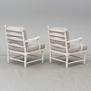 A pair of late 20th century gustavian style armchairs.