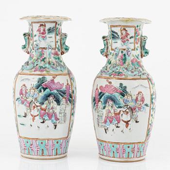 A pair of famille rose Canton vases and  a bowl, Qing dynasty, 19th Century.