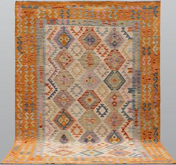 A Kilim carpet, approx. 296 x 198 cm.