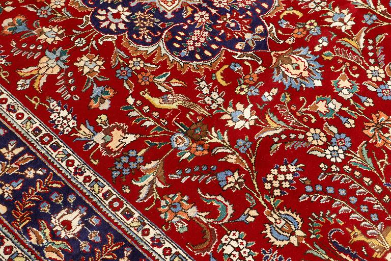 A carpet, Figural Tabriz, ca 310 x 220 cm.
