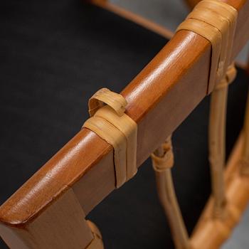 A pair of mahogany and rattan dining armchairs, Josef Frank, , model 1165, Svenskt Tenn, Stockholm.