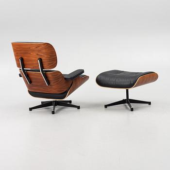 Charles & Ray Eames, Armchair with ottoman, "Lounge chair", Vitra, 21st century.