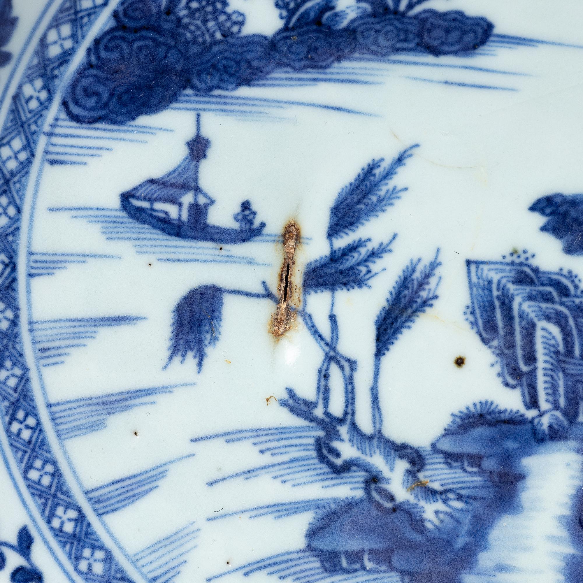 A group of three Chinese blue and white porcelain hot water dishes, Qing dynasty, 18/19th century.