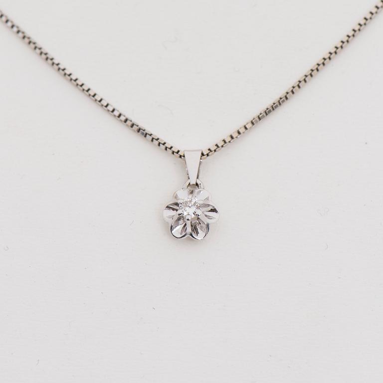 HÄNGE, 14K vitguld, briljantslipad diamant 0,10 ct. Vikt 3,8 g.