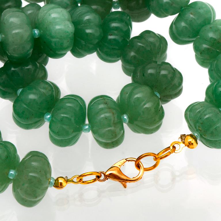 Necklace carved jade beads approx 15 mm and smaller glass beads , clasp metal, approx 50 cm.