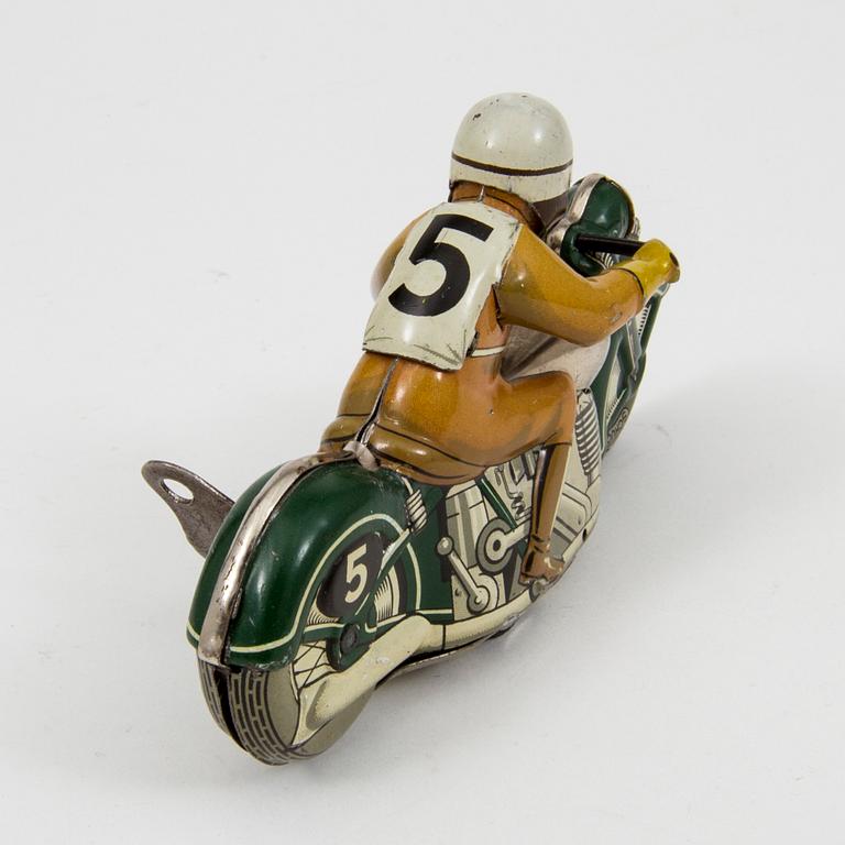 A Schuco Sport tinplate motorcycle 1930/40s.