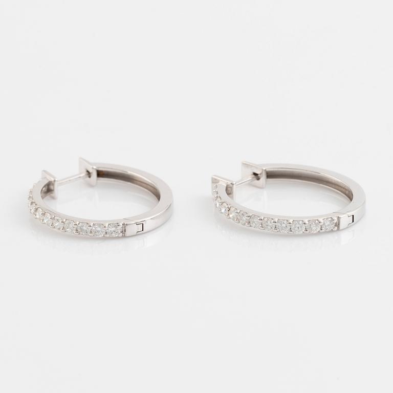 Brilliant cut diamond hopp earrings.