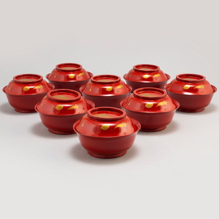 Eight lacquered bowls with covers, Japan, 20th century.