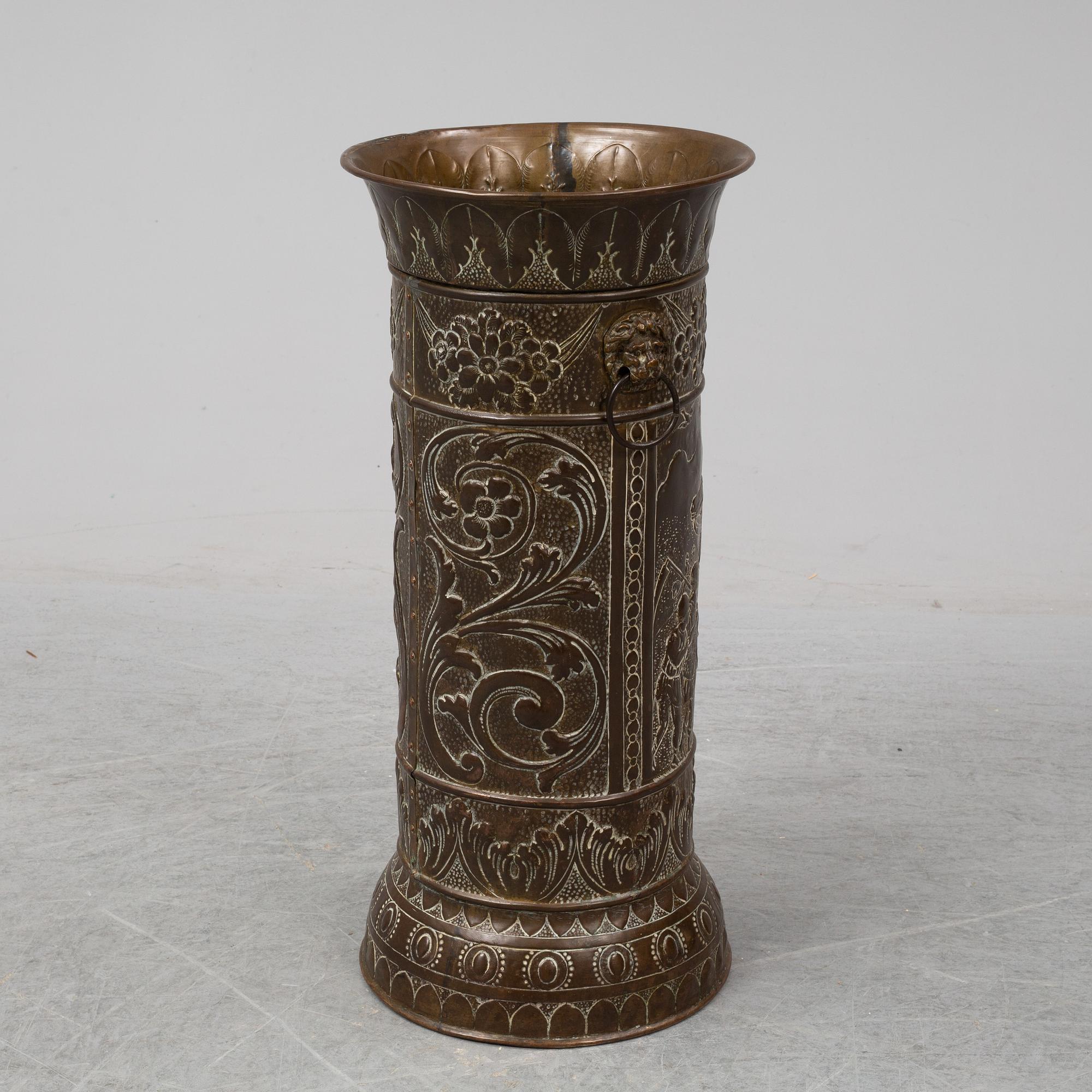 A 19th century brass umbrella stand.