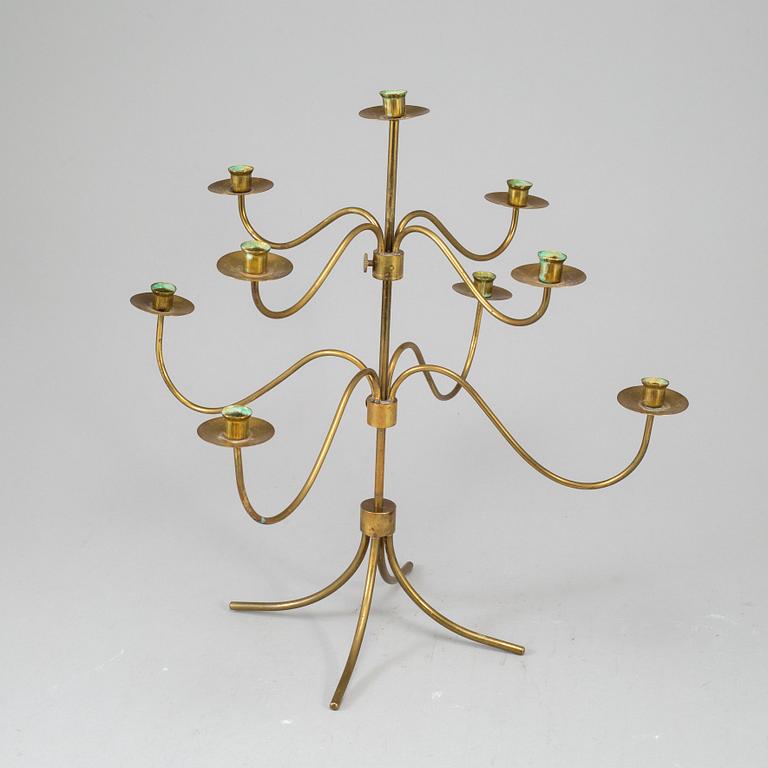 A BRASS CANDELABRUM, second half of the 20th century.