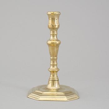 An 18th century bronze candlestick.