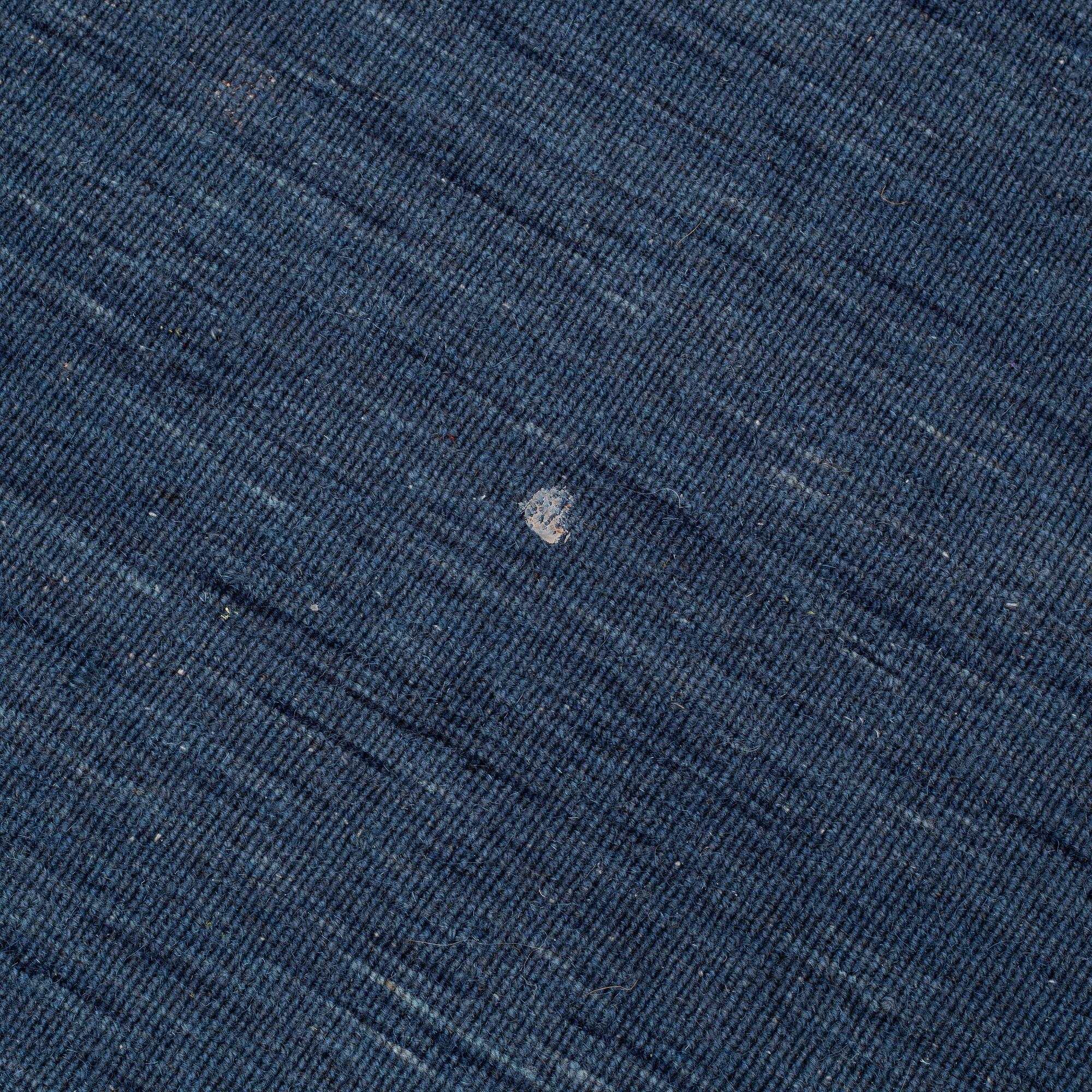 A loomed carpet, ca 400 x 300 cm.