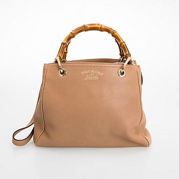 Gucci, a "Small Bamboo Shopper" bag.