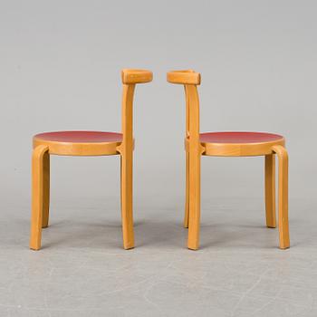 A set of six chairs by Magnus Olesen, Durup, Denmark.