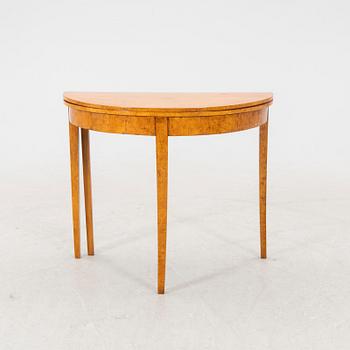A birch folding table later part of the 19th century.