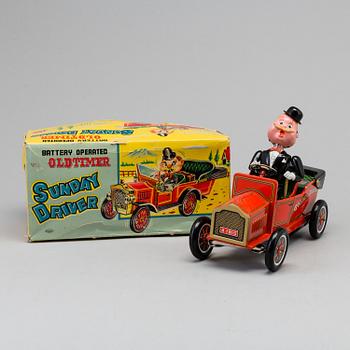 A toy metal car "Sunday Driver", Kosuge, Japan, and "Giant Helicopter", YF, Japan. 1960s.