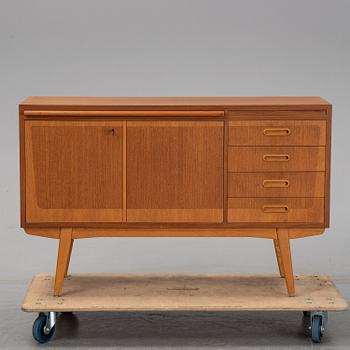 A 1950's teak sideboard.