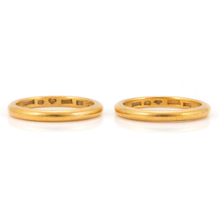 Two 23K gold rings.