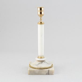 A late Gustavian brass and marble candelabra/candle holder, around the year 1800.