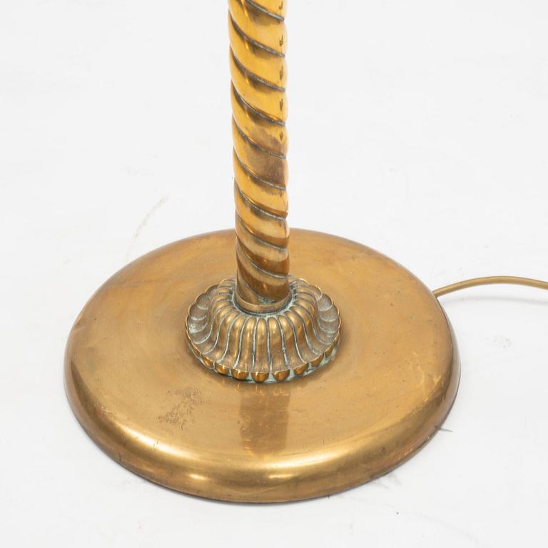 A 1930's brass floor lamp.