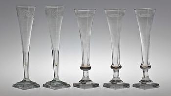 614. A set of five (3+2) champagne glasses, 19th century.