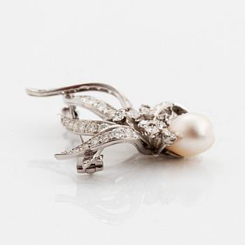 A WA Bolin brooch in platinum set with a pearl and round brilliant- and eight-cut diamonds.